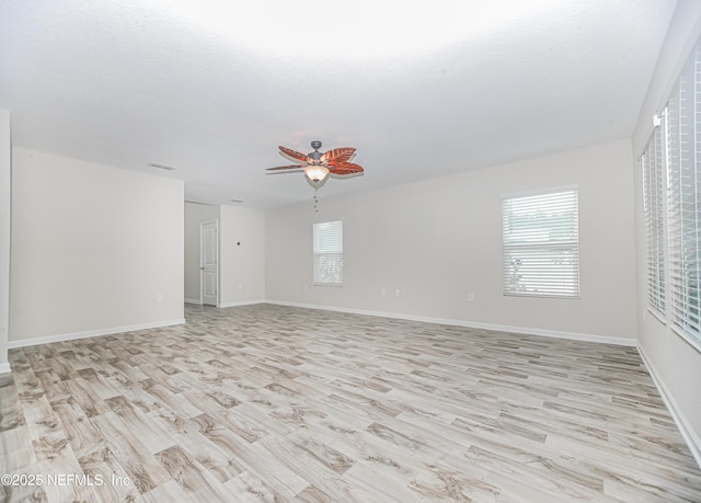 154 Moorcroft Way, Saint Augustine, FL 32092 - spare room featuring light wood-type flooring, healthy amount of natural light, and a ceiling fan