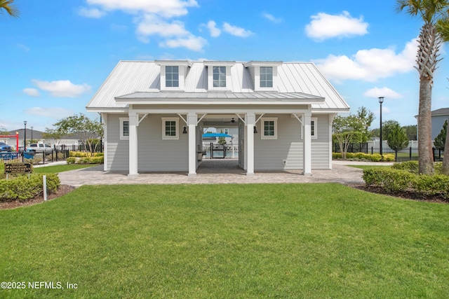 154 Moorcroft Way, Saint Augustine, FL 32092 - rear view of property featuring a metal roof, a porch, and a standing seam roof