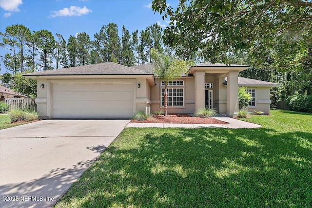 409 Spring Ridge Ct, Saint Augustine, FL 32092 - view of front of property with stucco siding, concrete driveway, a garage, and a front yard