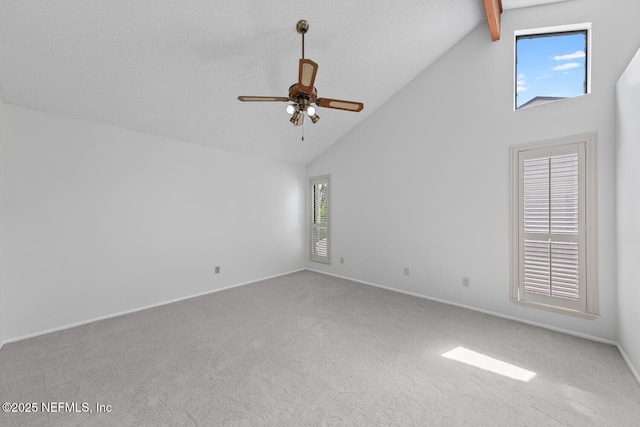 511 Selva Lakes Cir, Atlantic Beach, FL 32233 - carpeted empty room with high vaulted ceiling, ceiling fan, and beamed ceiling
