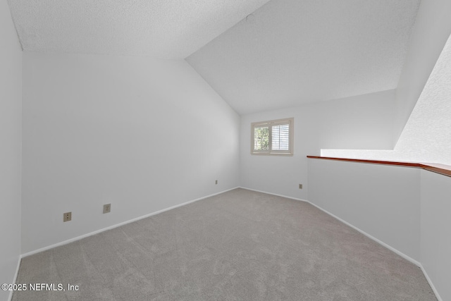 511 Selva Lakes Cir, Atlantic Beach, FL 32233 - bonus room featuring carpet, lofted ceiling, and a textured ceiling