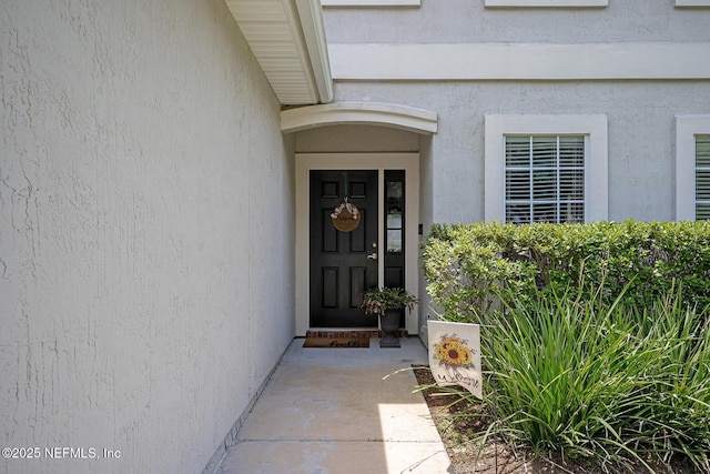 1341 River City St, Saint Augustine, FL 32092 - doorway to property with stucco siding