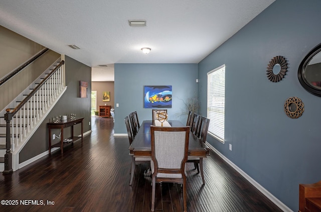 1341 River City St, Saint Augustine, FL 32092 - dining room with wood finished floors and stairs