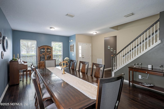 1341 River City St, Saint Augustine, FL 32092 - dining area with hardwood / wood-style floors, stairway, and a textured ceiling