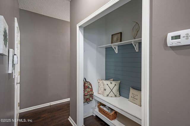 1341 River City St, Saint Augustine, FL 32092 - mudroom featuring dark wood-type flooring and baseboards