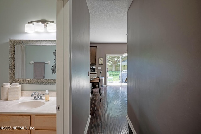 1341 River City St, Saint Augustine, FL 32092 - hall with a textured ceiling and dark wood finished floors