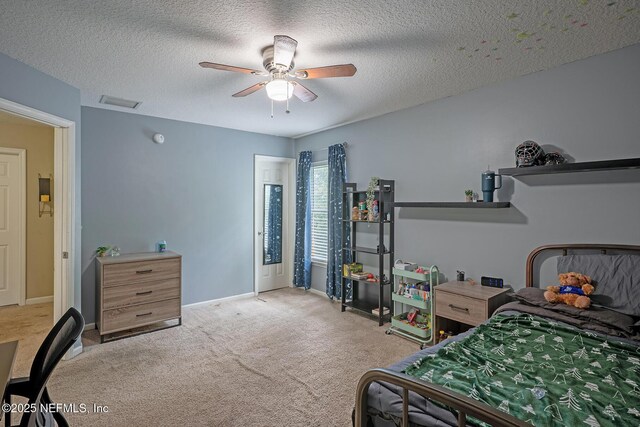 1341 River City St, Saint Augustine, FL 32092 - bedroom with carpet floors, a ceiling fan, and a textured ceiling