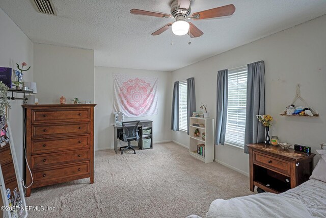 1341 River City St, Saint Augustine, FL 32092 - bedroom with carpet floors, an office area, a textured ceiling, and a ceiling fan