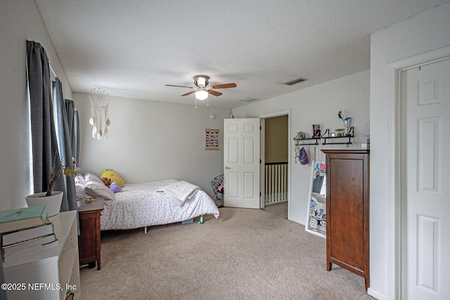 1341 River City St, Saint Augustine, FL 32092 - bedroom featuring light colored carpet, ceiling fan, and a textured ceiling