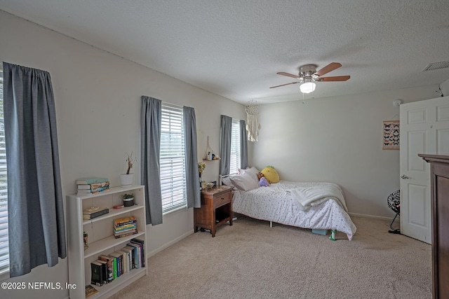 1341 River City St, Saint Augustine, FL 32092 - carpeted bedroom with a textured ceiling and a ceiling fan
