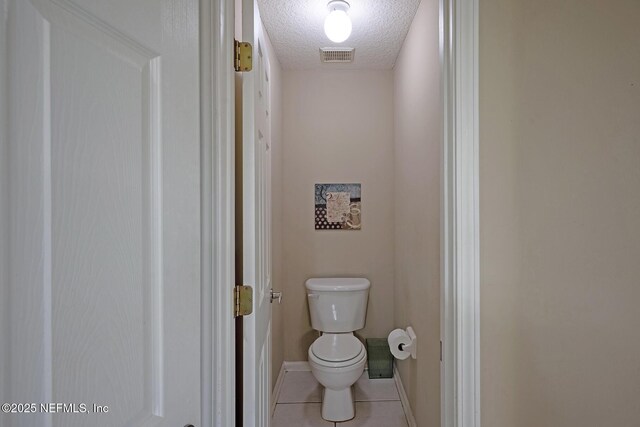 1341 River City St, Saint Augustine, FL 32092 - bathroom with a textured ceiling and tile patterned floors