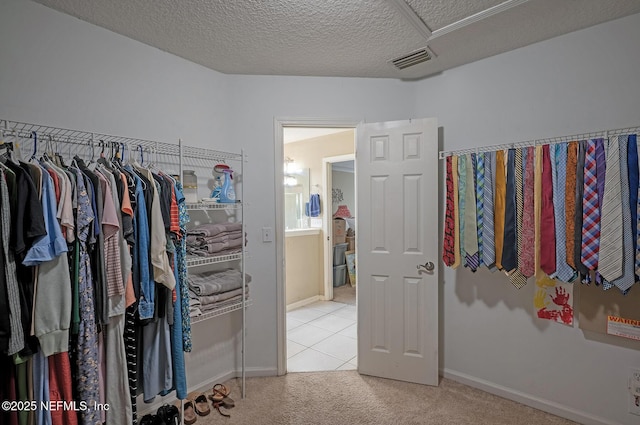 1341 River City St, Saint Augustine, FL 32092 - spacious closet with carpet flooring, attic access, and tile patterned flooring
