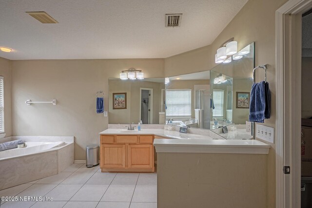 1341 River City St, Saint Augustine, FL 32092 - bathroom with a garden tub, tile patterned floors, and vanity