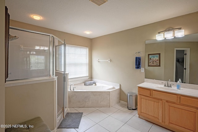 1341 River City St, Saint Augustine, FL 32092 - full bathroom featuring a stall shower, a garden tub, vanity, and tile patterned flooring