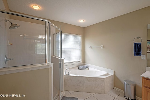 1341 River City St, Saint Augustine, FL 32092 - bathroom featuring vanity, a shower stall, a bath, and tile patterned flooring