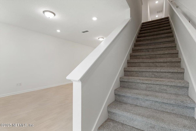 39 Thurnham Ln, Saint Augustine, FL 32092 - staircase with wood finished floors and recessed lighting