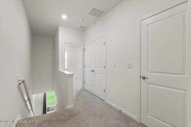 39 Thurnham Ln, Saint Augustine, FL 32092 - hallway with an upstairs landing, carpet floors, healthy amount of natural light, and recessed lighting
