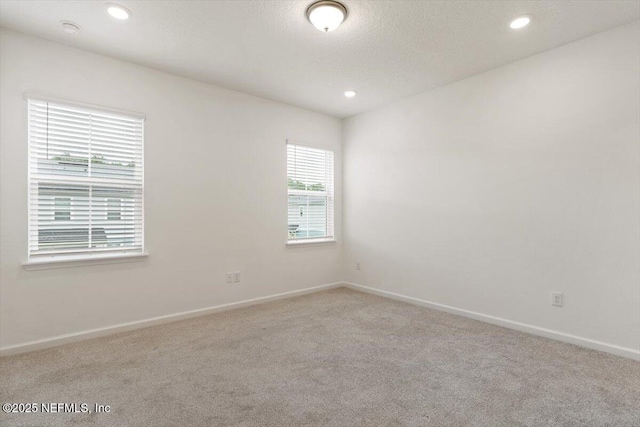 39 Thurnham Ln, Saint Augustine, FL 32092 - spare room featuring carpet, recessed lighting, and a smoke detector