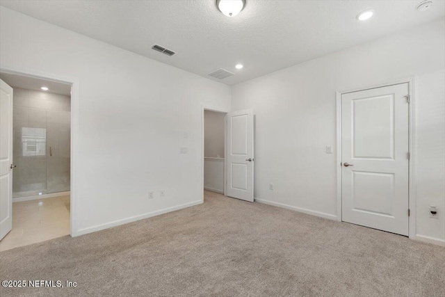 39 Thurnham Ln, Saint Augustine, FL 32092 - unfurnished bedroom with carpet, recessed lighting, and connected bathroom