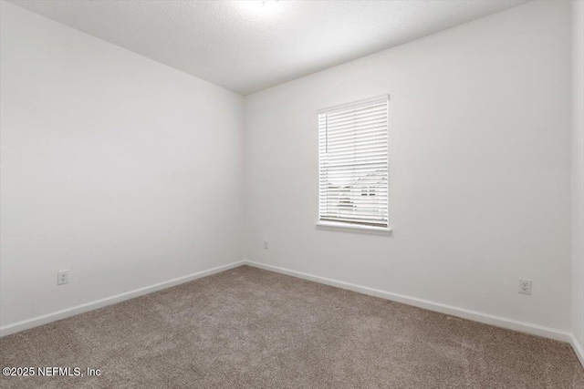 39 Thurnham Ln, Saint Augustine, FL 32092 - carpeted spare room featuring baseboards