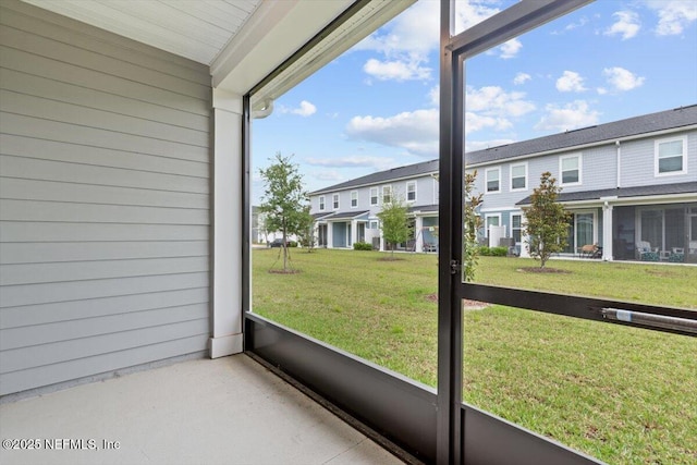 39 Thurnham Ln, Saint Augustine, FL 32092 - unfurnished sunroom featuring a residential view and plenty of natural light