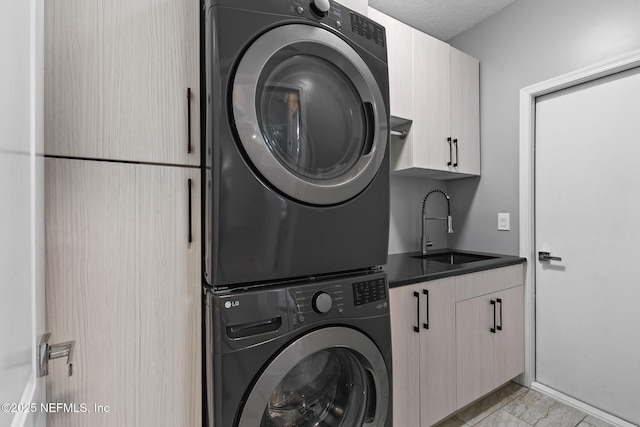 433 Big Tree Rd, Ponte Vedra Beach, FL 32082 - washroom featuring stacked washer / drying machine and cabinet space