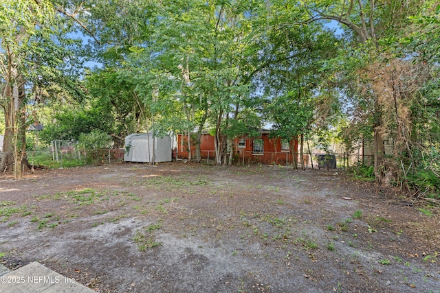 431 W 62nd St, Jacksonville, FL 32208 - view of yard with a shed