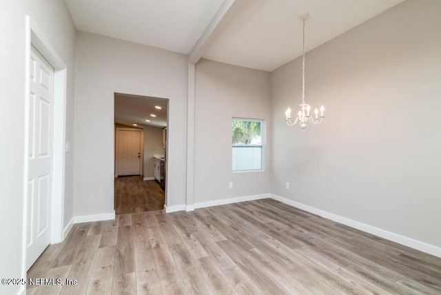 209 N 7th St, Palatka, FL 32177 - unfurnished dining area featuring a chandelier, light wood-style flooring, and recessed lighting