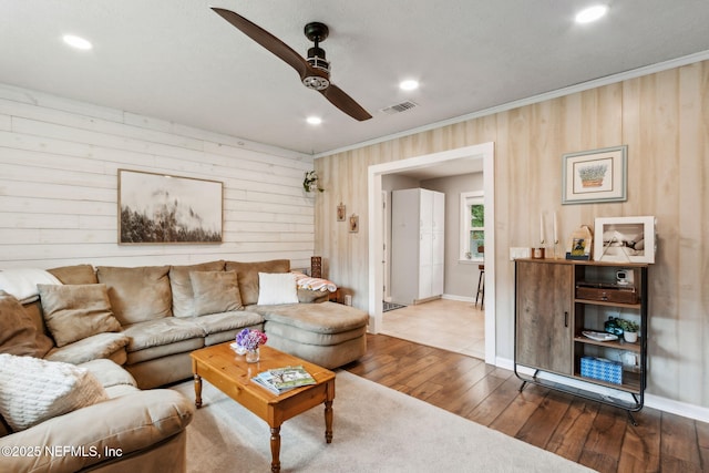 86759 Hester Dr, Yulee, FL 32097 - living room featuring wood-type flooring, a ceiling fan, wooden walls, ornamental molding, and recessed lighting