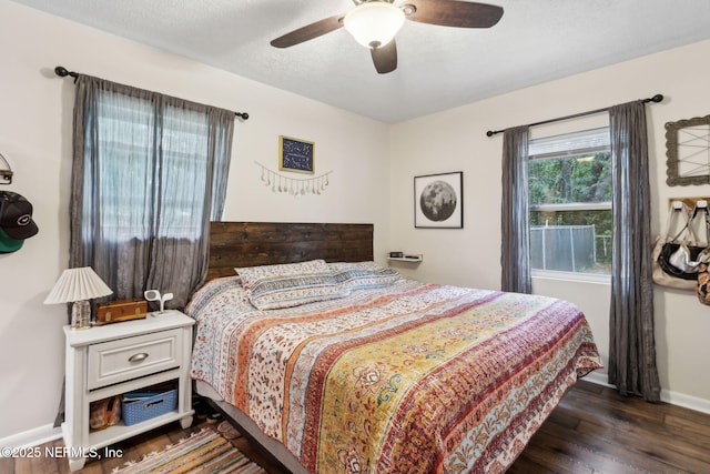 86759 Hester Dr, Yulee, FL 32097 - bedroom with wood finished floors and a ceiling fan