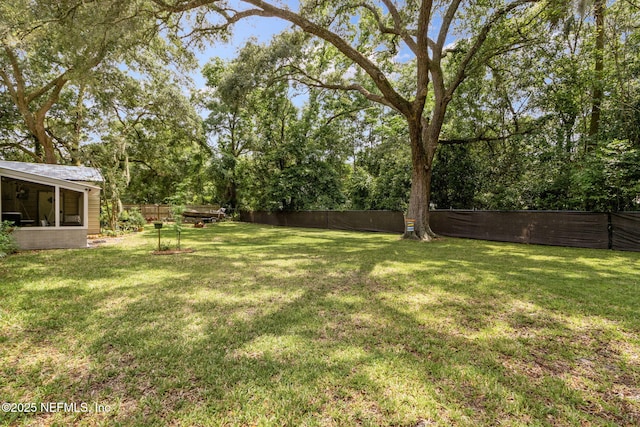 86759 Hester Dr, Yulee, FL 32097 - fenced backyard with view of scattered trees