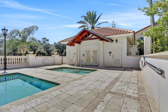 14402 Marina San Pablo Pl Unit 203, Jacksonville, FL 32224 - view of swimming pool featuring a patio and french doors