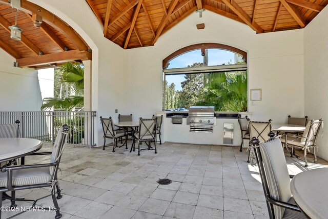 14402 Marina San Pablo Pl Unit 203, Jacksonville, FL 32224 - view of patio / terrace with outdoor dining space and exterior kitchen