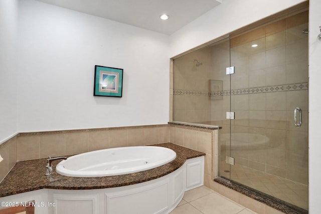 14402 Marina San Pablo Pl Unit 203, Jacksonville, FL 32224 - bathroom with a garden tub, a shower stall, and tile patterned flooring