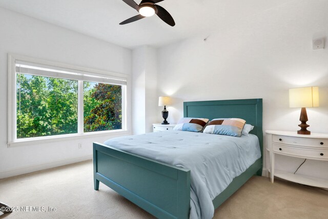 14402 Marina San Pablo Pl Unit 203, Jacksonville, FL 32224 - bedroom featuring light colored carpet and a ceiling fan