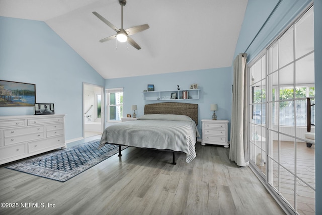 107 Hammock Cir, Saint Augustine, FL 32084 - bedroom with high vaulted ceiling, wood finished floors, ceiling fan, and connected bathroom