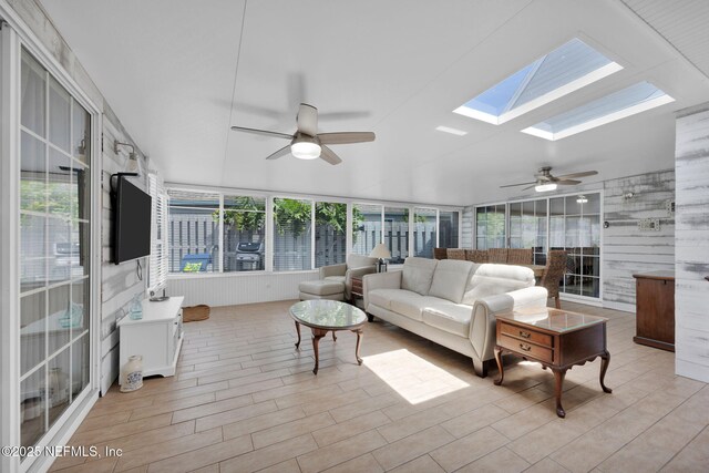 107 Hammock Cir, Saint Augustine, FL 32084 - sunroom featuring ceiling fan, a skylight, and an outdoor living space