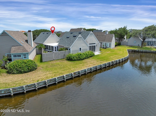 107 Hammock Cir, Saint Augustine, FL 32084 - back of property with a water view, a residential view, and a fenced backyard