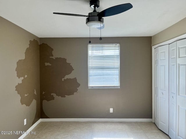 1713 El Camino Rd Unit 3, Jacksonville, FL 32216 - unfurnished bedroom with a closet, light tile patterned flooring, and ceiling fan