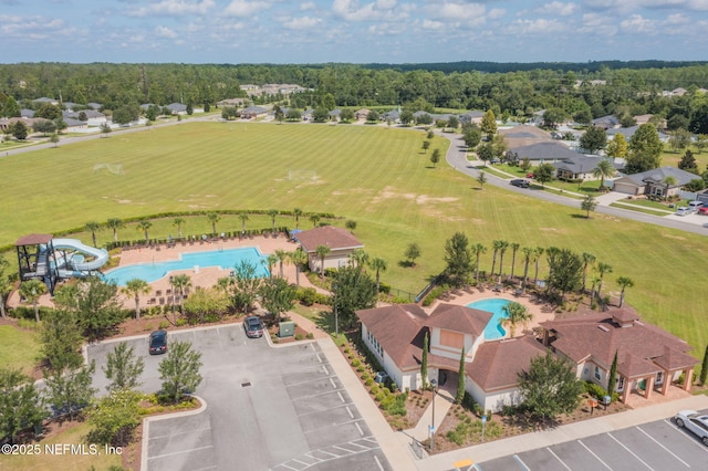 4433 Warm Springs Way, Middleburg, FL 32068 - drone / aerial view of a pool area