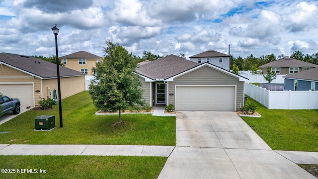 4433 Warm Springs Way, Middleburg, FL 32068 - traditional-style home with concrete driveway, a garage, and a residential view