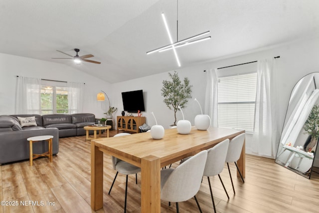 13967 Devan Lee Dr N, Jacksonville, FL 32226 - dining room with light wood-type flooring, lofted ceiling, and ceiling fan
