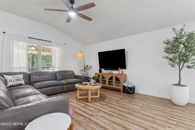 13967 Devan Lee Dr N, Jacksonville, FL 32226 - living area featuring lofted ceiling, ceiling fan, and light wood-style flooring