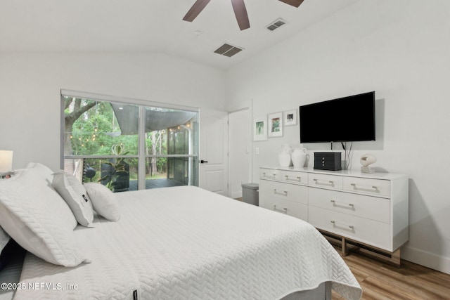 13967 Devan Lee Dr N, Jacksonville, FL 32226 - bedroom with wood finished floors, vaulted ceiling, and a ceiling fan