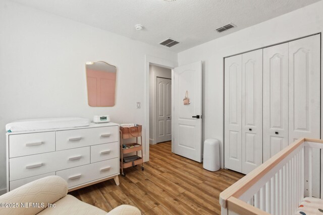 13967 Devan Lee Dr N, Jacksonville, FL 32226 - bedroom with wood finished floors and a closet