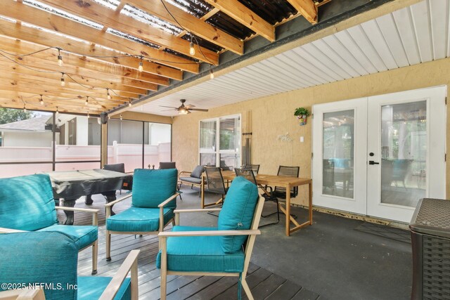 13967 Devan Lee Dr N, Jacksonville, FL 32226 - wooden terrace with french doors, outdoor dining area, and a ceiling fan