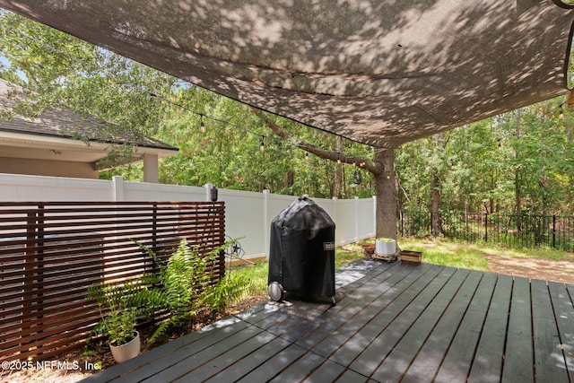 13967 Devan Lee Dr N, Jacksonville, FL 32226 - wooden deck featuring a fenced backyard