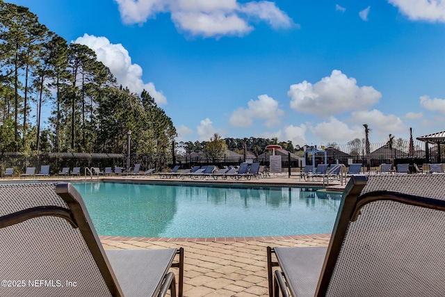 13967 Devan Lee Dr N, Jacksonville, FL 32226 - community pool with a patio area