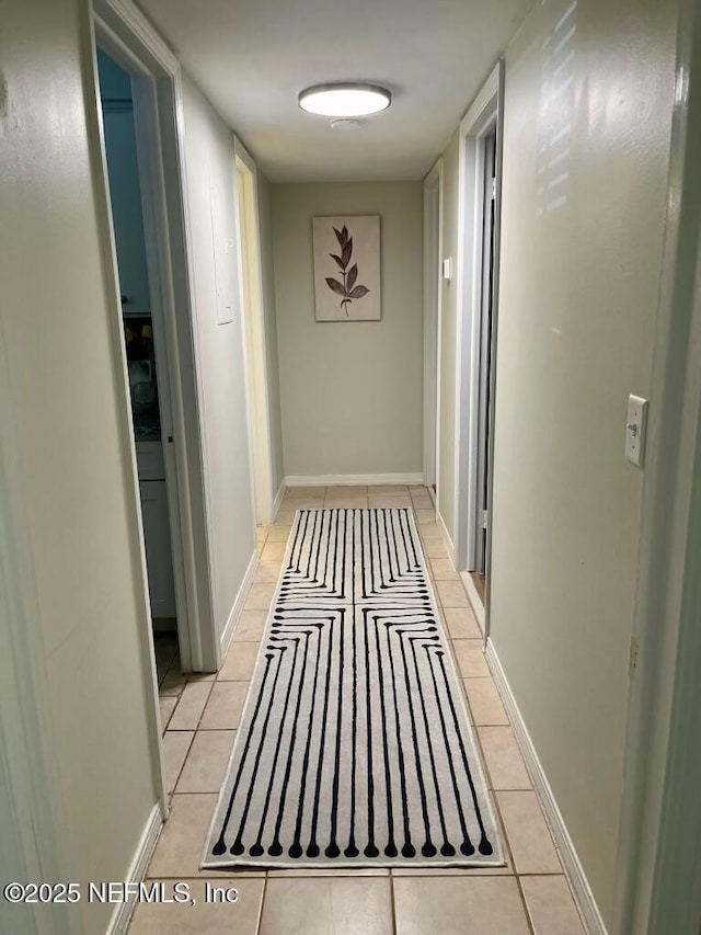 1716 El Camino Rd Unit 3, Jacksonville, FL 32216 - hallway with light tile patterned flooring
