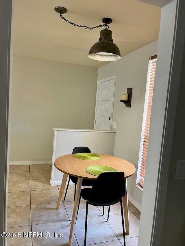 1716 El Camino Rd Unit 3, Jacksonville, FL 32216 - dining space featuring light tile patterned floors